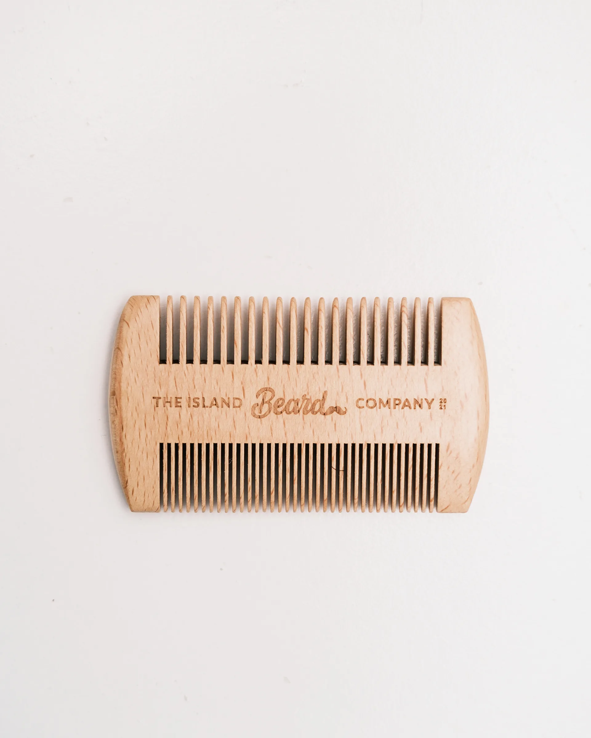 Wooden beard comb with engraved logo