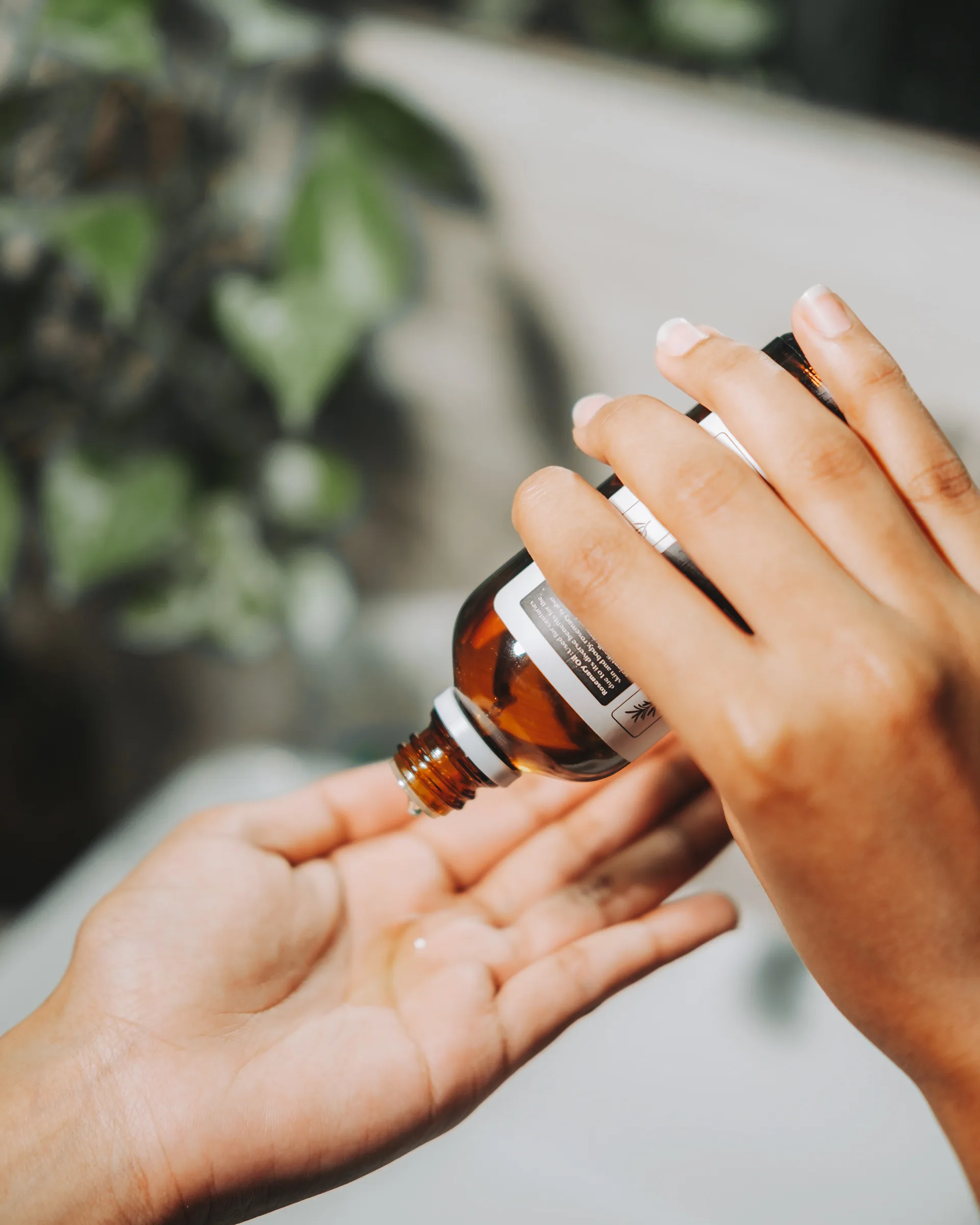 Beard oil dropped into an open palm